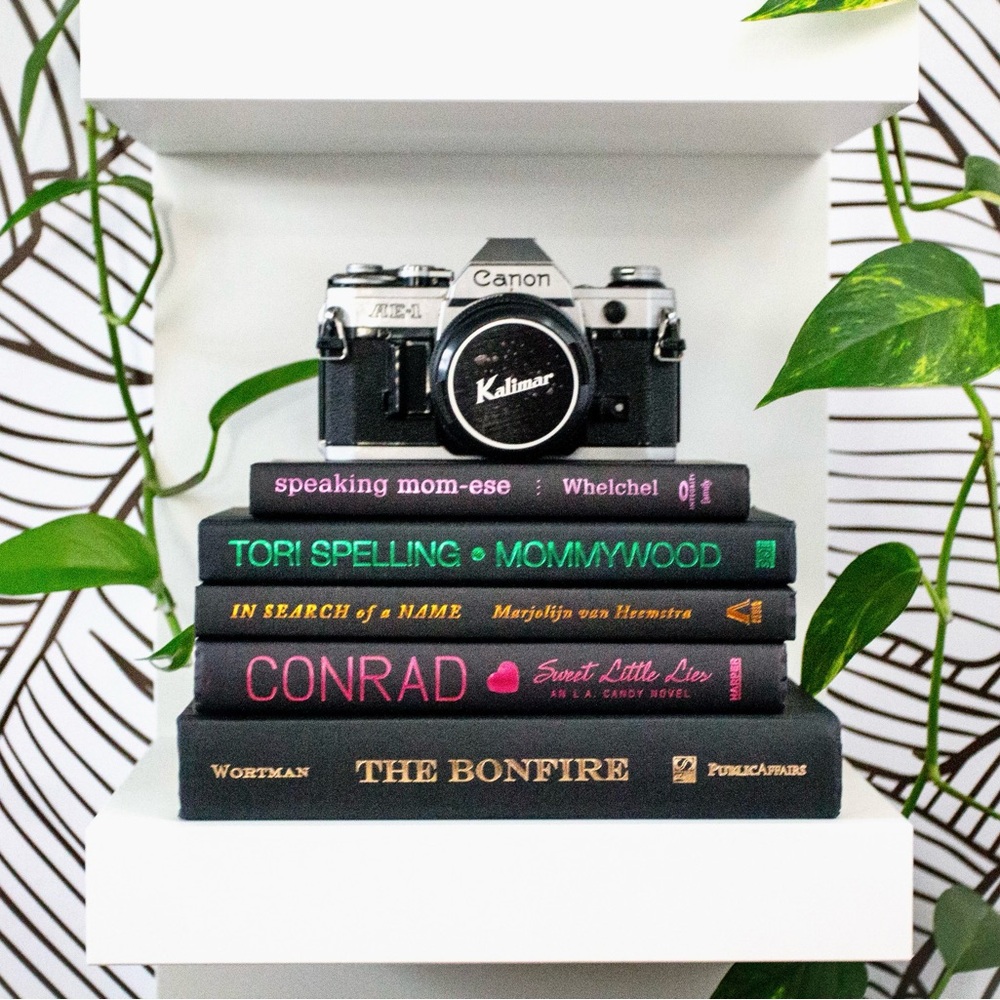 4 Black Books with Colorful spines for Interior Decor